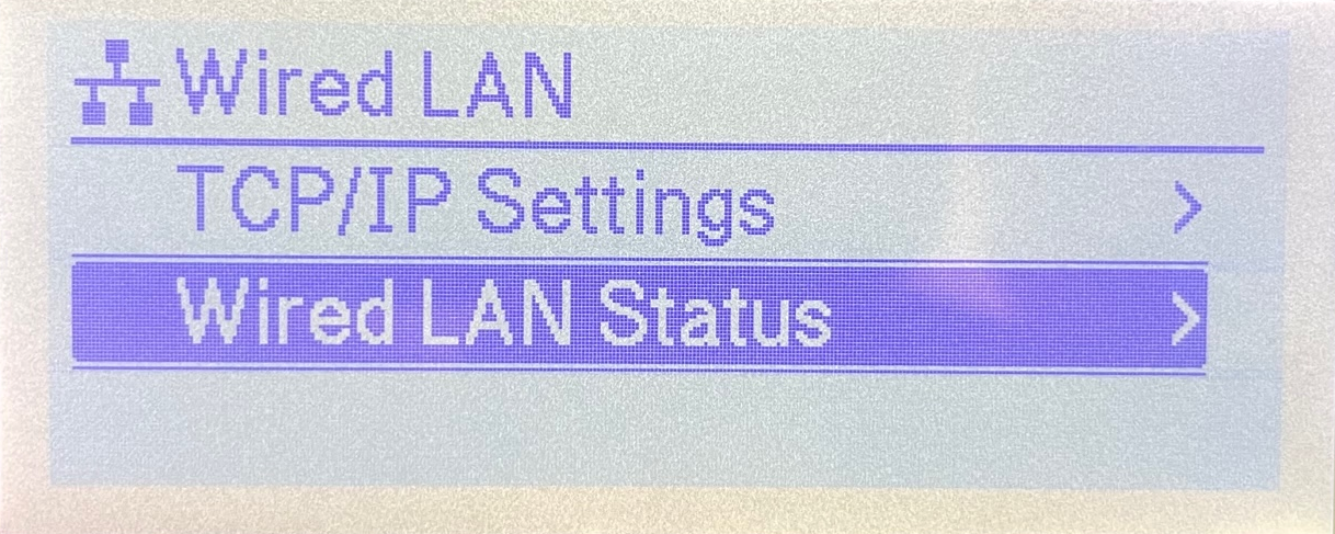 Menú de Configuración TCP/IP en la pantalla LCD de impresora de etiquetas Brother TD-4550DNWB con la opción Estado de LAN Cableada seleccionada.