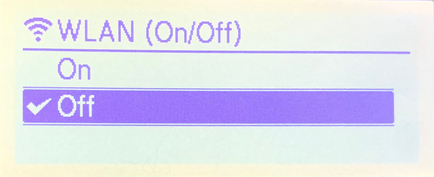 Écran LCD de l’imprimante d'étiquettes Brother TD-4550DNWB affichant le menu WLAN (ON/OFF) avec le réseau désactivé.