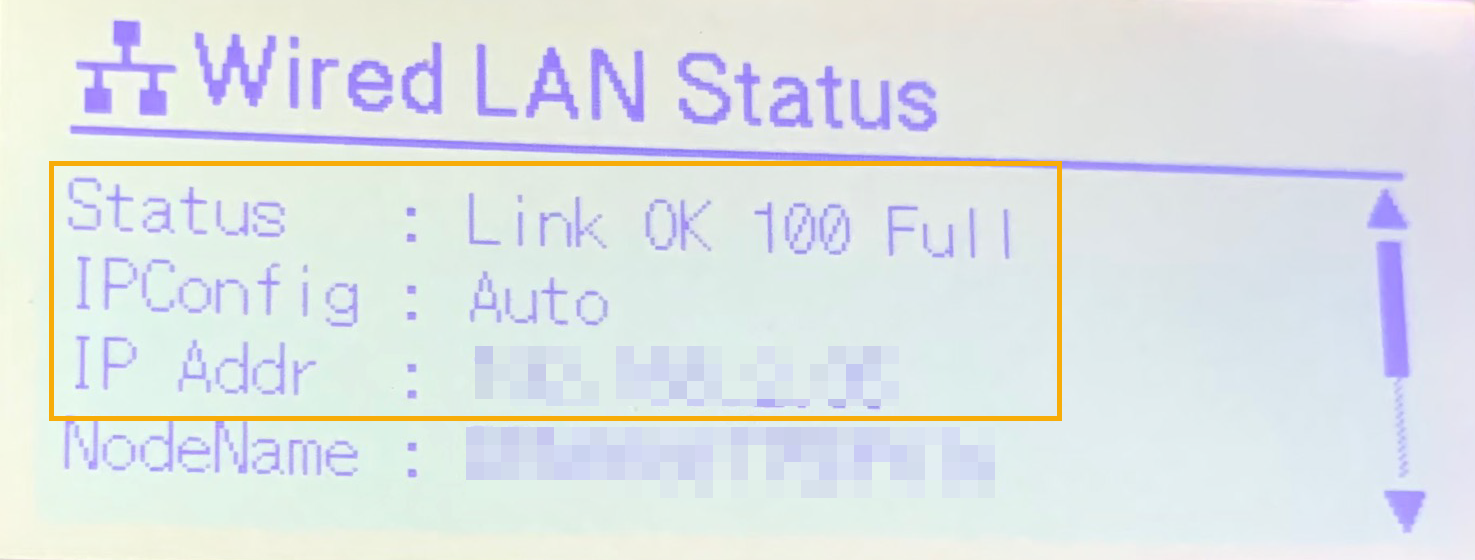 Brother TD-4550DNWB label printer LCD display Wired LAN Status showing connection details.