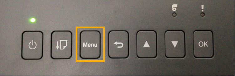 Brother TD-4550DNWB label printer LCD display controls with the menu button highlighted.