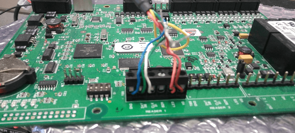 Mercury EP1502 controller board with Qscan reader wiring loom connected.