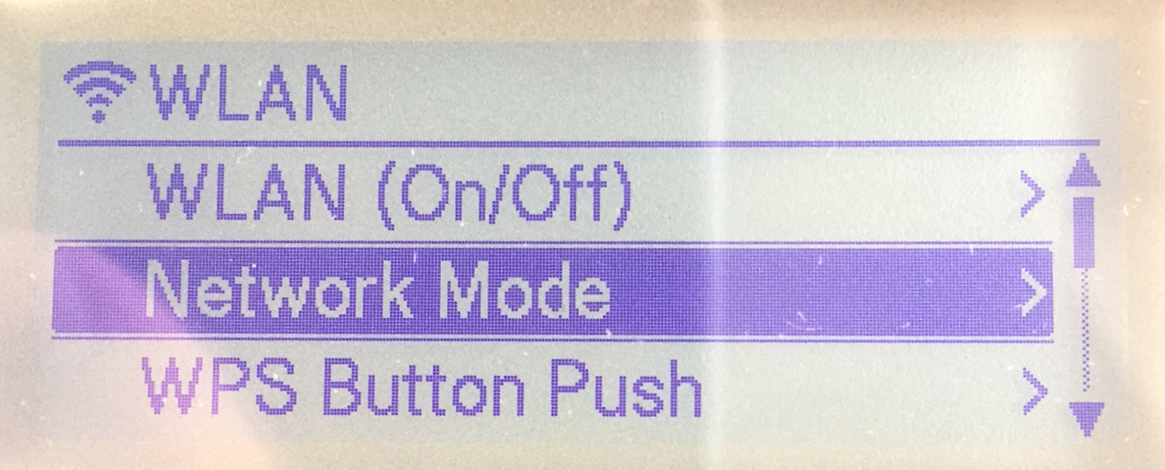 Brother TD-4550DNWB label printer LCD display showing the WLAN network mode menu.