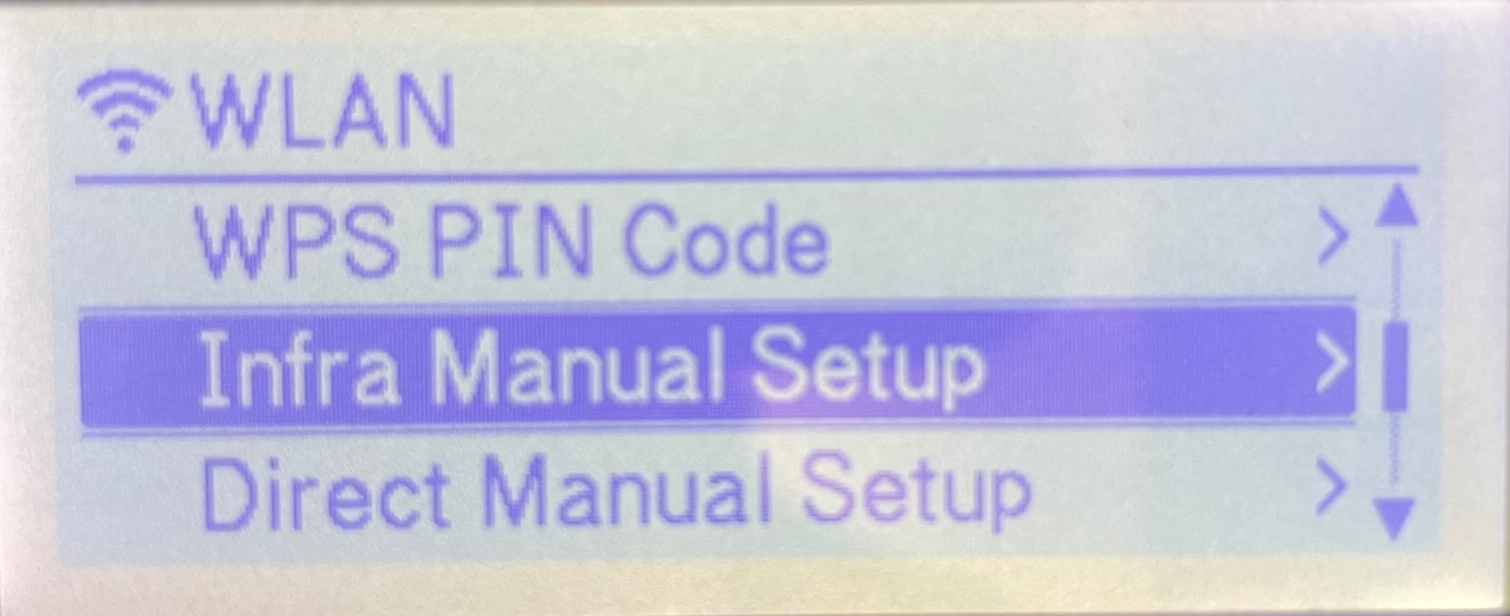 Brother TD-4550DNWB label printer LCD display showing the WLAN network mode menu with Infra Manual Setup selected.